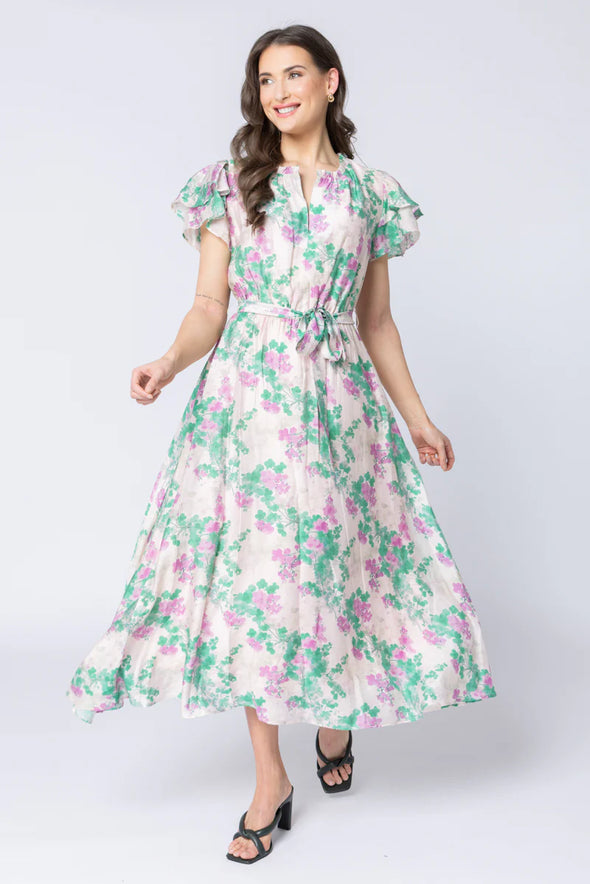 Elegant floral print in the signature Zen Garden pattern

V-neckline with collar and subtle hook-and-eye closure

Short double-layered butterfly sleeves for a feminine finish

Elasticated waist with removable tie belt for a flattering silhouette

Maxi length with soft, graceful movement

Comfortable cotton lining

Main Fabric: 73% Tencel, 11% Linen, 16% Nylon

Lining: 100% Cotton