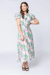 Elegant floral print in the signature Zen Garden pattern

V-neckline with collar and subtle hook-and-eye closure

Short double-layered butterfly sleeves for a feminine finish

Elasticated waist with removable tie belt for a flattering silhouette

Maxi length with soft, graceful movement

Comfortable cotton lining

Main Fabric: 73% Tencel, 11% Linen, 16% Nylon

Lining: 100% Cotton