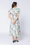 Elegant floral print in the signature Zen Garden pattern

V-neckline with collar and subtle hook-and-eye closure

Short double-layered butterfly sleeves for a feminine finish

Elasticated waist with removable tie belt for a flattering silhouette

Maxi length with soft, graceful movement

Comfortable cotton lining

Main Fabric: 73% Tencel, 11% Linen, 16% Nylon

Lining: 100% Cotton
