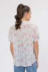 95% Polyester, 5% Spandex

Sheer floral blouse in soft pink Crinkle Blossom print

Delicate pleat detailing for added texture

Puffed short sleeves with a feminine silhouette

Lightweight and versatile for layering or wearing alone
