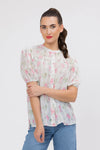 95% Polyester, 5% Spandex

Sheer floral blouse in soft pink Crinkle Blossom print

Delicate pleat detailing for added texture

Puffed short sleeves with a feminine silhouette

Lightweight and versatile for layering or wearing alone