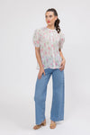 95% Polyester, 5% Spandex

Sheer floral blouse in soft pink Crinkle Blossom print

Delicate pleat detailing for added texture

Puffed short sleeves with a feminine silhouette

Lightweight and versatile for layering or wearing alone