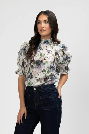 Chic and feminine, the Seeking Lola Notting Hill Top in Water Bloom Print is a lightweight floral blouse perfect for effortless everyday style.