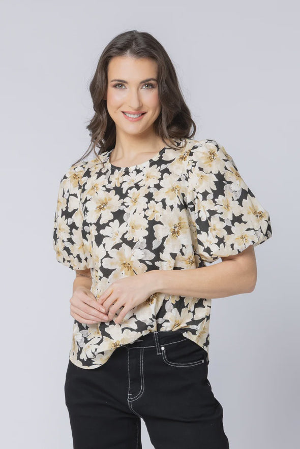 All-over crinkle texture for a soft, relaxed finish

Delicate floral print adds feminine detail

Round neckline with button keyhole at the back

Elasticated cuffs for comfortable wear

Unlined with a standard, easy fit