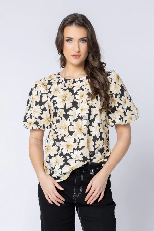 All-over crinkle texture for a soft, relaxed finish

Delicate floral print adds feminine detail

Round neckline with button keyhole at the back

Elasticated cuffs for comfortable wear

Unlined with a standard, easy fit
