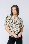 All-over crinkle texture for a soft, relaxed finish

Delicate floral print adds feminine detail

Round neckline with button keyhole at the back

Elasticated cuffs for comfortable wear

Unlined with a standard, easy fit