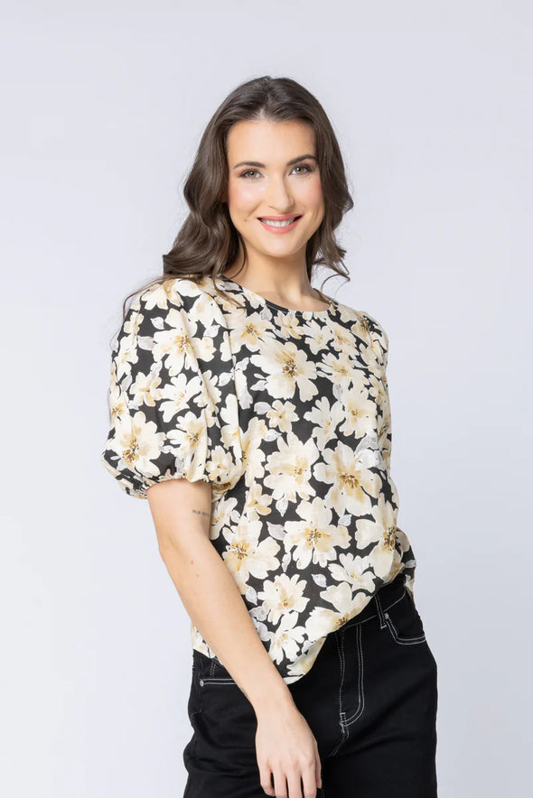 All-over crinkle texture for a soft, relaxed finish

Delicate floral print adds feminine detail

Round neckline with button keyhole at the back

Elasticated cuffs for comfortable wear

Unlined with a standard, easy fit