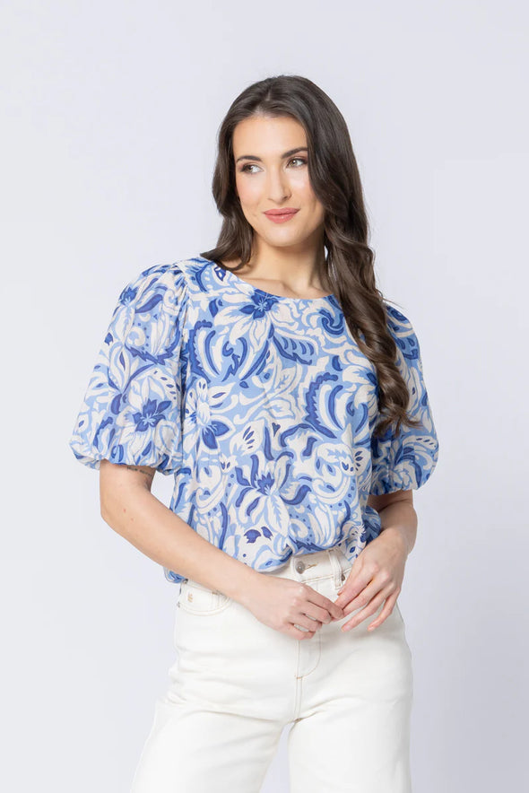 All-over crinkle texture for a soft, relaxed finish

Delicate floral print adds feminine detail

Round neckline with button keyhole at the back

Elasticated cuffs for comfortable wear

Unlined with a standard, easy fit

Made from 100% breathable cotton