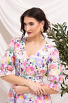 Signature Summer Lovin print for a bold, romantic look

3/4 sleeves with shirred detail for comfort and charm

Flattering V-neckline

Feminine, easy-wear silhouette

Crafted from breathable 100% cotton

Perfect for dressing up or down

Effortless styling: pair with white sneakers for daytime or elevate with heels and gold jewellery for special occasions