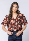 Soft cotton-blend fabric for comfort and breathability

Flattering V-neckline with frill detailing

3/4 puff sleeves for a feminine, stylish silhouette

Shaped back hem for a flattering finish

Ideal for seasonal transitions and everyday wear

Beautiful floral print for an elevated, timeless look