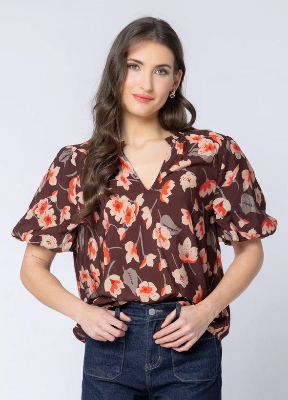 Soft cotton-blend fabric for comfort and breathability

Flattering V-neckline with frill detailing

3/4 puff sleeves for a feminine, stylish silhouette

Shaped back hem for a flattering finish

Ideal for seasonal transitions and everyday wear

Beautiful floral print for an elevated, timeless look