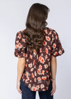 Soft cotton-blend fabric for comfort and breathability

Flattering V-neckline with frill detailing

3/4 puff sleeves for a feminine, stylish silhouette

Shaped back hem for a flattering finish

Ideal for seasonal transitions and everyday wear

Beautiful floral print for an elevated, timeless look