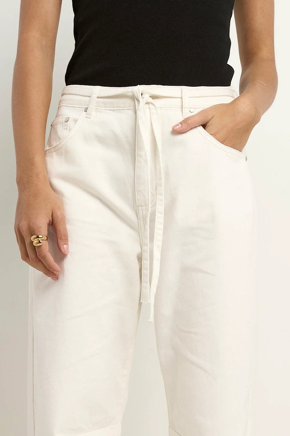 100% Cotton denim

High-rise fit for a flattering waistline

Barrel-leg cut for a modern, relaxed silhouette

Soft ecru wash for versatile styling

Self-tie waist belt for an adjustable fit