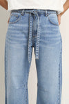 100% Cotton denim

High-rise fit for a flattering waistline

Barrel-leg cut for a relaxed, on-trend look

Soft light blue wash for everyday versatility

Self-tie waist belt for added shape and styling