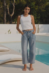 100% Cotton denim

High-rise fit for a flattering waistline

Barrel-leg cut for a relaxed, on-trend look

Soft light blue wash for everyday versatility

Self-tie waist belt for added shape and styling