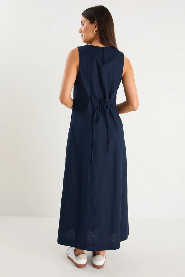 Crew neckline with a sleek sleeveless silhouette

Contrasting white side stripe for a modern statement

Midi length for a flattering, versatile fit

Easy to dress up or style casually

Fabric Composition: 55% Linen, 45% Cotton