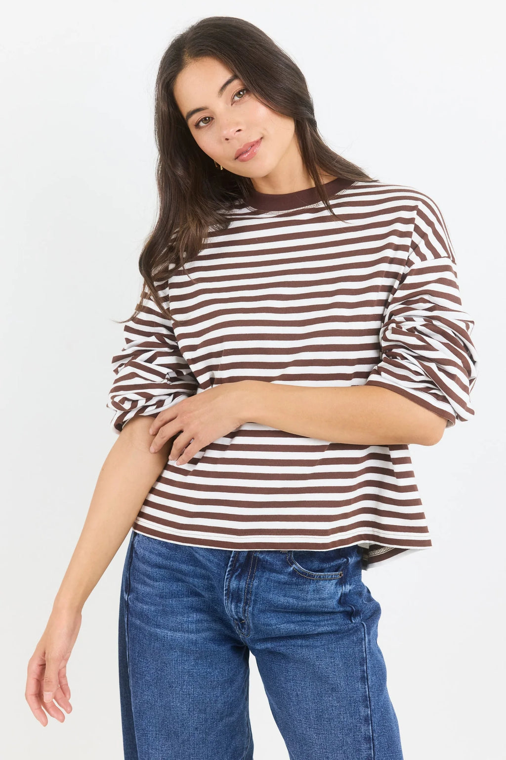 A classic stripe tee, the Unite Chocolate White Stripe Tee is an easy staple for everyday dressing. Designed with long sleeves, a crew neckline and an oversized boxy fit, it has a relaxed silhouette that feels effortless while still looking polished.