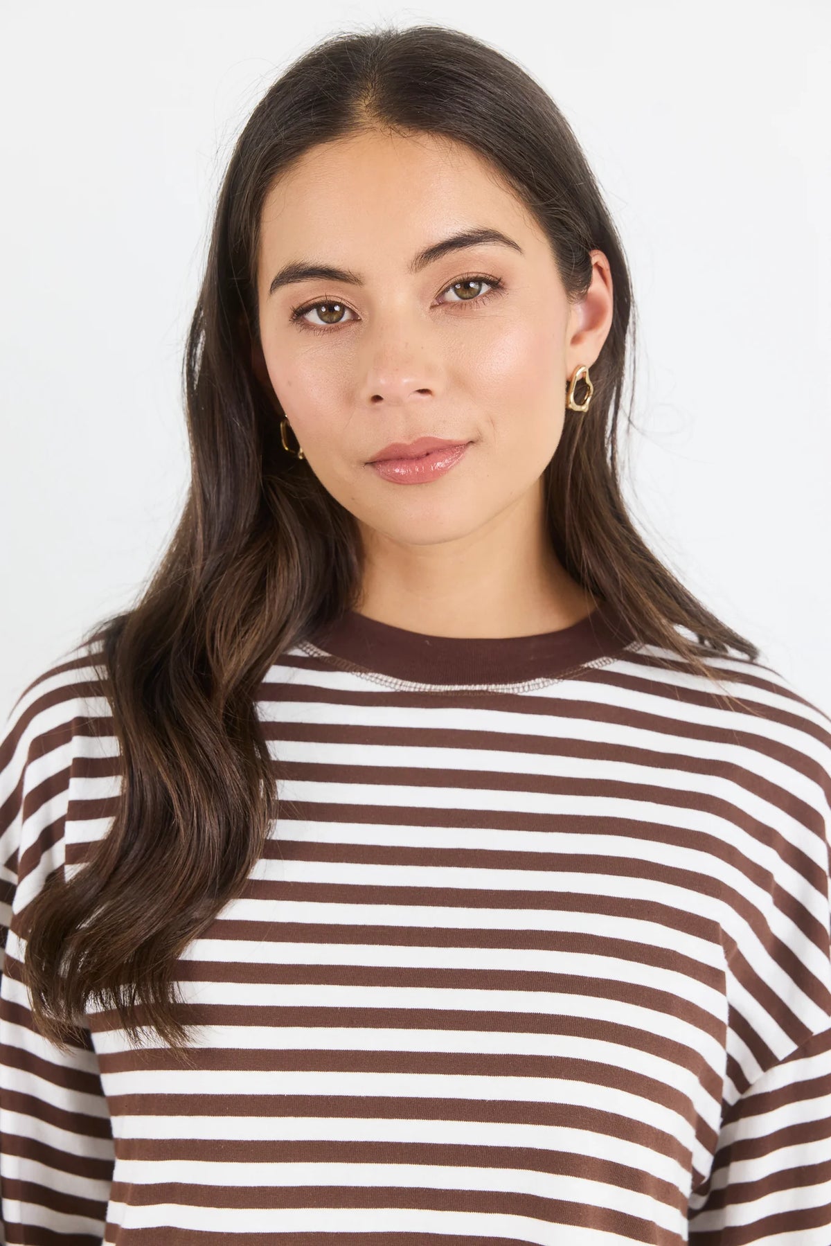 A classic stripe tee, the Unite Chocolate White Stripe Tee is an easy staple for everyday dressing. Designed with long sleeves, a crew neckline and an oversized boxy fit, it has a relaxed silhouette that feels effortless while still looking polished