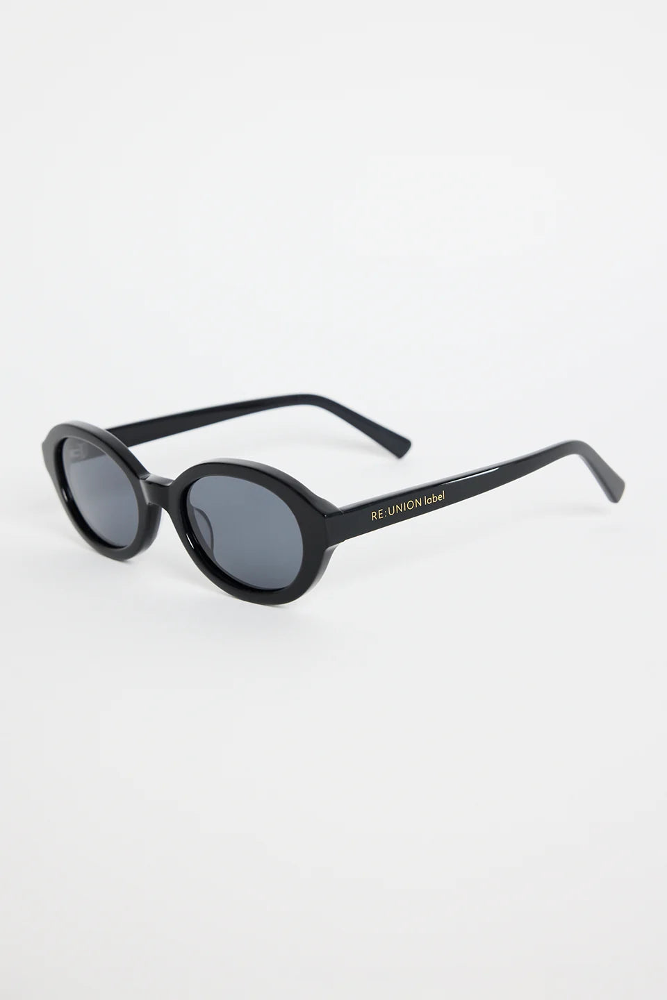 Sleek, minimal, and endlessly wearable, the Vienna Black Oval Sunglasses are your new go-to for everyday style. The smooth oval frame adds a modern twist to a classic shape, while the deep black finish keeps things sharp and refined. Lightweight and easy to pair with any outfit, they bring that subtle cool-girl energy we all love.

An effortless staple that elevates every sunny-day look.

- Recycled Acetate

- UV Protection Category 3
