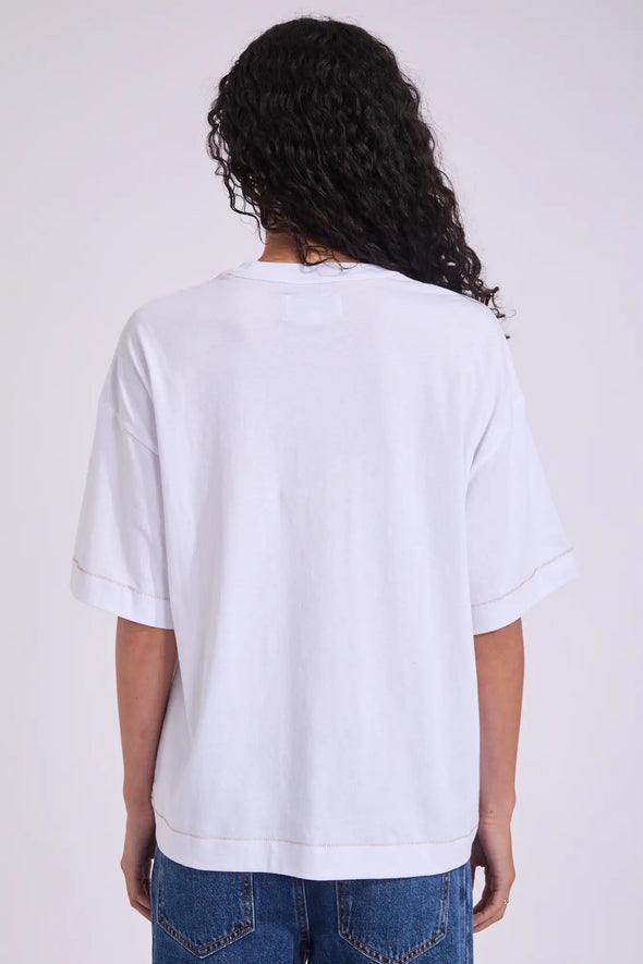 Relaxed, boxed fit with dropped sleeves for a modern silhouette

Crew neckline for classic styling

Bold graphic print to the front

Contrast stitch details for a subtle design edge

Made from 100% soft, breathable cotton