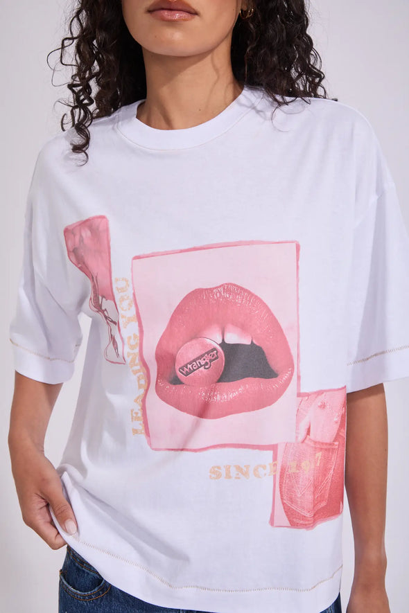 Relaxed, boxed fit with dropped sleeves for a modern silhouette

Crew neckline for classic styling

Bold graphic print to the front

Contrast stitch details for a subtle design edge

Made from 100% soft, breathable cotton