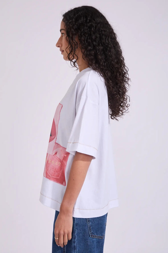 Relaxed, boxed fit with dropped sleeves for a modern silhouette

Crew neckline for classic styling

Bold graphic print to the front

Contrast stitch details for a subtle design edge

Made from 100% soft, breathable cotton