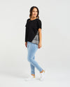 Relaxed, flowy fit for all-day comfort

Short sleeves with a flattering silhouette

Black front with contrasting check back detail

Longer back hem for added shape and interest

Easy to style for casual or dressy occasions

Body: 95% Cotton 5% Spandex
Back: 55% Polyester 45% Rayon
