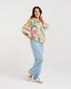 Bright Radiant print for a bold, modern look

Classic button-down style with collar neckline

3/4 puff sleeves with elasticated cuffs

Lace inserts and scalloped trim for feminine detail

Versatile shirt for work, weekends, or events

70% Rayon 30% Nylon