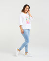 White T-shirt with bold floral print

Relaxed fit with round neckline

Flared sleeves just below the elbow

Modern, feminine design

Easy to style for casual or dressy looks

94% Cotton 6% Elastane