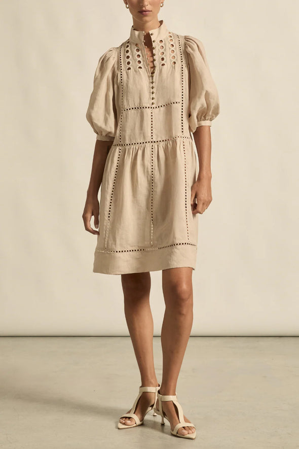 100% ramie with cami slip included

Relaxed fit, designed to sit off the body

Drop waist silhouette for flattering ease

Elbow-length blouson sleeves for soft volume

High stand collar with antique brass button detailing