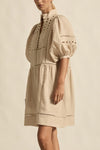 100% ramie with cami slip included

Relaxed fit, designed to sit off the body

Drop waist silhouette for flattering ease

Elbow-length blouson sleeves for soft volume

High stand collar with antique brass button detailing