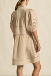 100% ramie with cami slip included

Relaxed fit, designed to sit off the body

Drop waist silhouette for flattering ease

Elbow-length blouson sleeves for soft volume

High stand collar with antique brass button detailing