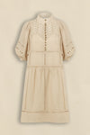 100% ramie with cami slip included

Relaxed fit, designed to sit off the body

Drop waist silhouette for flattering ease

Elbow-length blouson sleeves for soft volume

High stand collar with antique brass button detailing