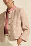 100% polyester boucle

Vintage-inspired pink for a romantic, feminine mood

Fully lined in soft stretch fabric for added comfort

Round neckline and cropped fit for styling versatility

Brushed-brass domed buttons for elevated detailing

Rounded-off front pockets blending into the boucle texture