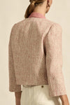 100% polyester boucle

Vintage-inspired pink for a romantic, feminine mood

Fully lined in soft stretch fabric for added comfort

Round neckline and cropped fit for styling versatility

Brushed-brass domed buttons for elevated detailing

Rounded-off front pockets blending into the boucle texture