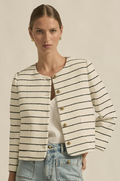 Crafted in 100% cotton

Fully lined in soft stretch fabric for all day comfort

Summer-weight boucle texture with a timeless feel

Round neckline and cropped silhouette for styling versatility

Brushed brass domed buttons for a refined accent

Rounded off front pockets that blend seamlessly into the boucle

Classic tailoring influence with a modern edge