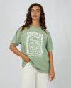 The Costiera Relaxed Tee in sage green brings easygoing style with a comfy, breathable fit that feels like a gentle breeze all day long. Its bold white hand-drawn print adds an artsy twist to a calm, neutral shade. Pair it with your fave high-waisted jeans or sharp shorts for a look that’s effortlessly cool—perfect for anything from coffee runs to evening hangs.