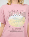 Add a touch of mountain magic with the Rocky Mountains Relaxed Tee in soft blush Rose Quartz! Made from 100% cotton, this tee features a faded graphic of Colorado’s iconic peaks for a chill, vintage vibe. Its cozy fit pairs perfectly with classic denim or snug joggers—ideal for relaxed days that call for mountain-inspired style with a playful twist.