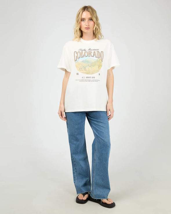 The Rocky Mountains Relaxed Tee wraps you in soft 100% cotton comfort, spotlighting a vintage-style Colorado peaks graphic that’s faded just like your best adventure stories. With its easy, relaxed fit, this tee effortlessly teams up with denim, joggers, or athleisure for a chill, timeless vibe that’s as bold as the mountains themselves.