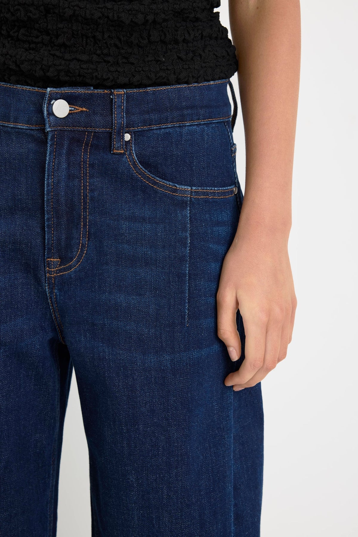 Meet your new everyday denim favourite. The Graduate Dark Blue Wide Leg Jean is designed with a flattering mid-rise waist and an effortlessly chic wide-leg silhouette that's made for every occasion. Crafted from comfort stretch denim, it offers the perfect balance of structure and flexibility, holding its shape while moving with you. Easy to dress up or down, it's the pair you'll keep reaching for season after season.