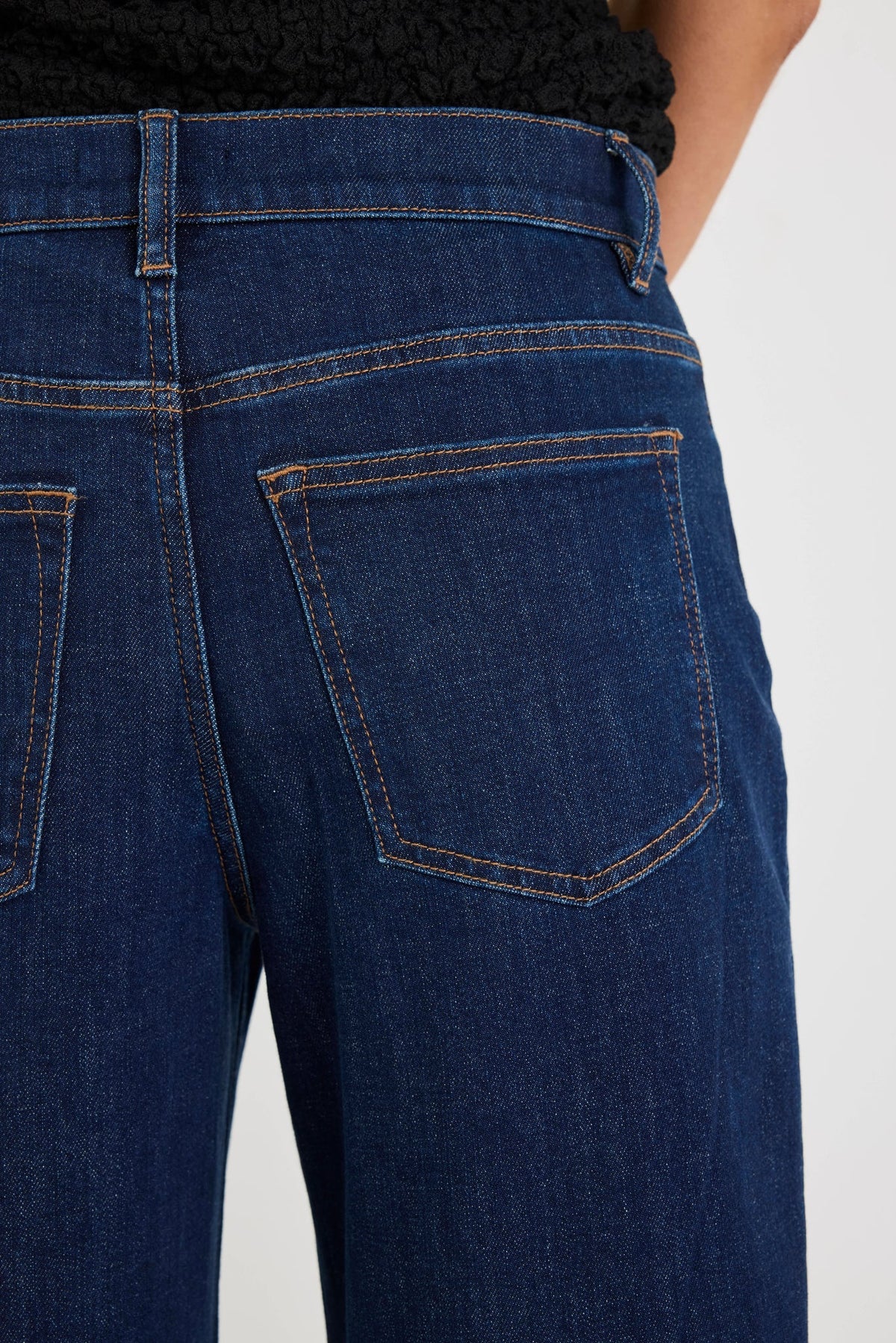 Meet your new everyday denim favourite. The Graduate Dark Blue Wide Leg Jean is designed with a flattering mid-rise waist and an effortlessly chic wide-leg silhouette that's made for every occasion. Crafted from comfort stretch denim, it offers the perfect balance of structure and flexibility, holding its shape while moving with you. Easy to dress up or down, it's the pair you'll keep reaching for season after season.