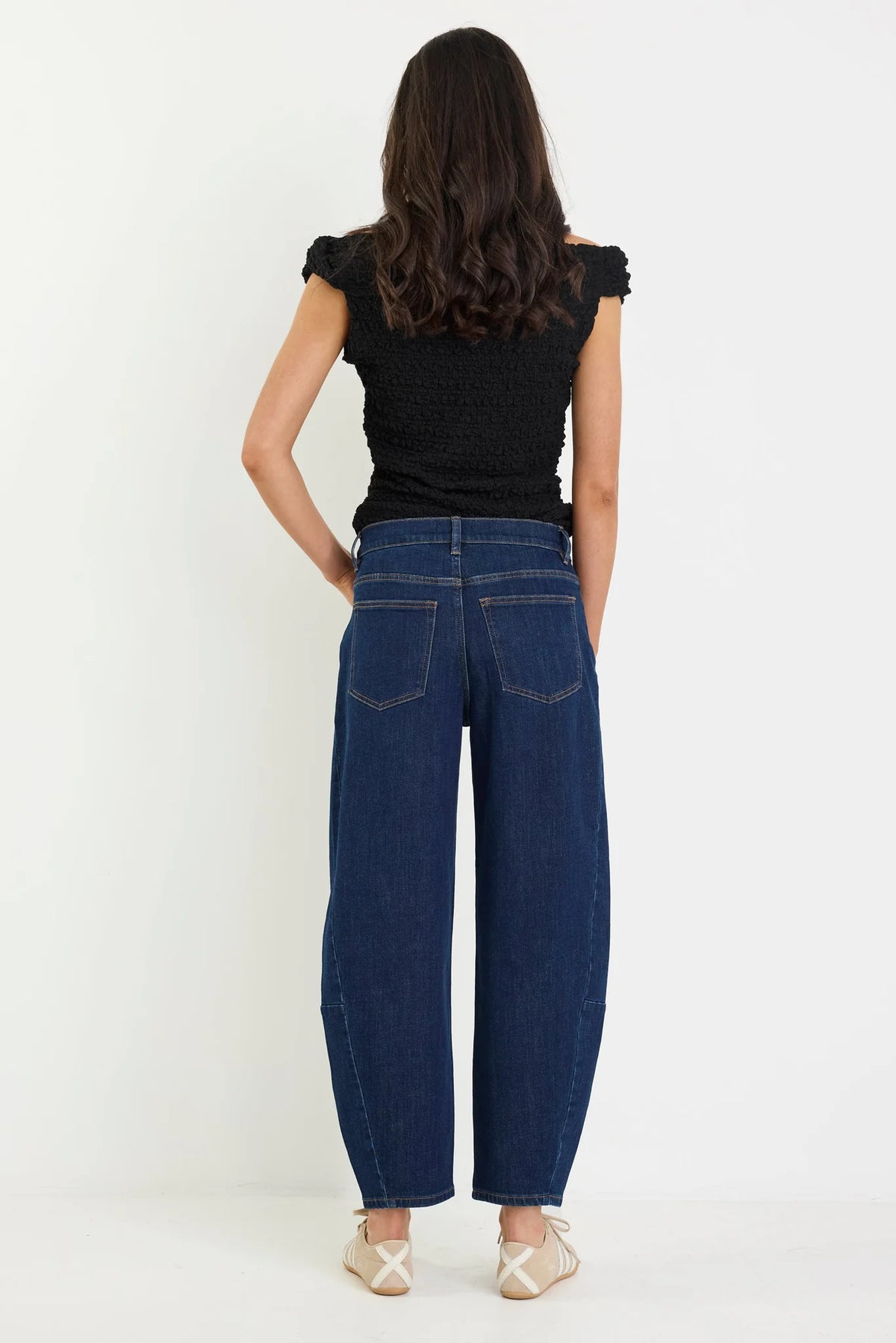 Meet your new everyday denim favourite. The Graduate Dark Blue Wide Leg Jean is designed with a flattering mid-rise waist and an effortlessly chic wide-leg silhouette that's made for every occasion. Crafted from comfort stretch denim, it offers the perfect balance of structure and flexibility, holding its shape while moving with you. Easy to dress up or down, it's the pair you'll keep reaching for season after season.