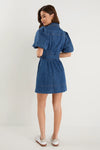 - Statement puff sleeves for a bold yet feminine look
- Button-down front for a classic touch
- Adjustable waist belt for a flattering, cinched silhouette
- Crafted from soft indigo denim with contrast stitching
- Fabric Composition - 80% Cotton 20% Polyester