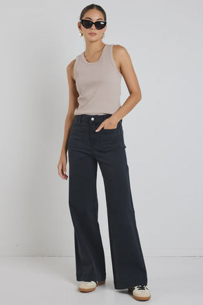 Introducing the Zoey Jean, your new best friend for effortless style. This wide leg jean, features uniquely designed front pockets that add a touch of sophistication to your look. We love these indigo jeans as not only do they look great, but they feel great too.