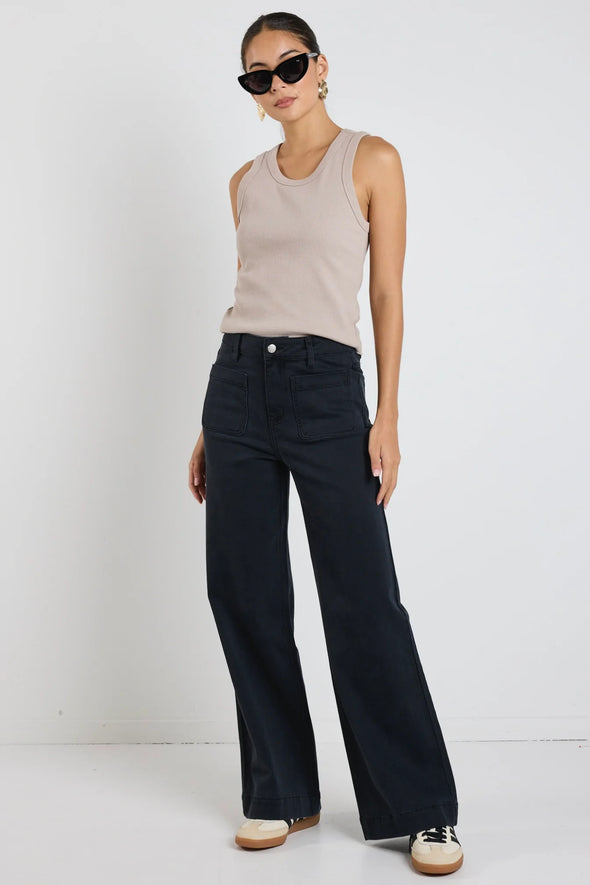 Introducing the Zoey Jean, your new best friend for effortless style. This wide leg jean, features uniquely designed front pockets that add a touch of sophistication to your look. We love these indigo jeans as not only do they look great, but they feel great too.