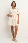 - Statement puff sleeves for a bold yet feminine look
- Button-down front for a classic touch
- Adjustable waist belt for a flattering, cinched silhouette
- Crafted from soft ecru denim with contrast stitching