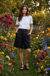 High-waisted fit with a sleek fly front and hook closure

Elasticated waistband at the back for comfort

Relaxed wide-leg silhouette

Functional pockets for everyday ease

Belt loops for versatile styling

Made from breathable 100% linen

Standard fit with no stretch