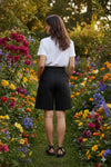 High-waisted fit with a sleek fly front and hook closure

Elasticated waistband at the back for comfort

Relaxed wide-leg silhouette

Functional pockets for everyday ease

Belt loops for versatile styling

Made from breathable 100% linen

Standard fit with no stretch