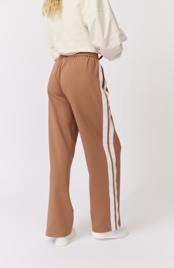 The most epic upstyled trackpant you will ever find. Toffee colour with double white side stripe and draw string waist. true to size and limited stock