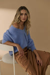 a beautiful V neck fluffy jumper, with luxury ripped detail and relaxed style. the softest periwinkle colour.
